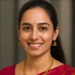 Smiling Indian woman in traditional attire and jewelry, representing culture, wellness, and holistic healing at Dr. Jyoti Dharmdas Homeo Clinic, Bhopal, guided by Dr. Renu Rajput Barigal – the best homeopathy doctor in Bhopal.